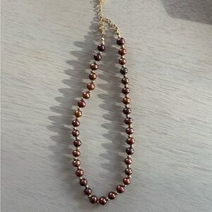 Elegant Pearl Necklace in Rich Tones